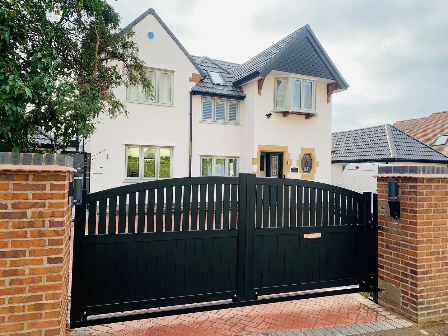 Arched gates with a matching side gate